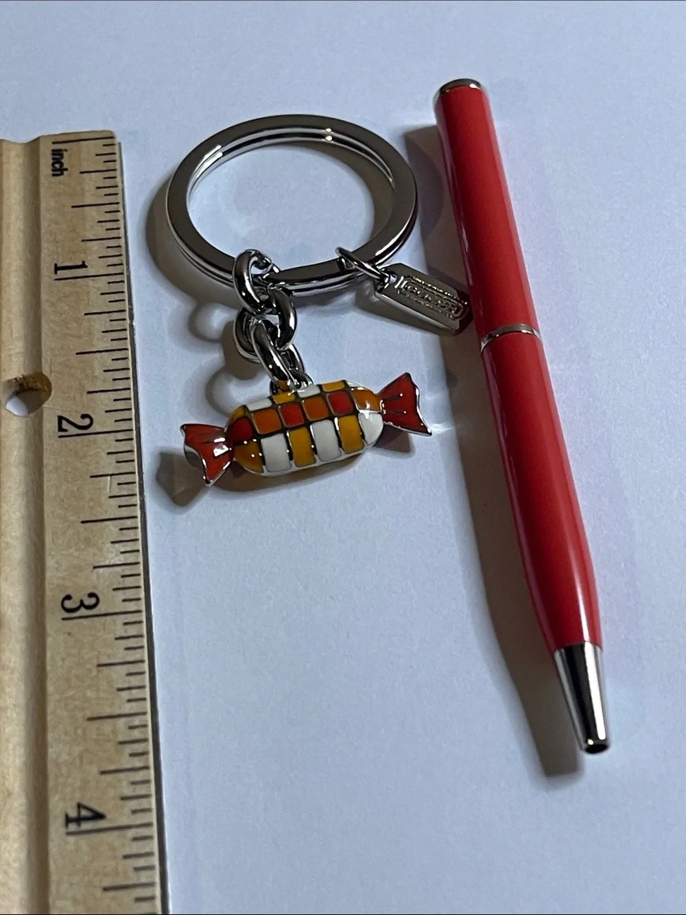 Coach Orange & White Candy Charm Keychain and Coach Pen